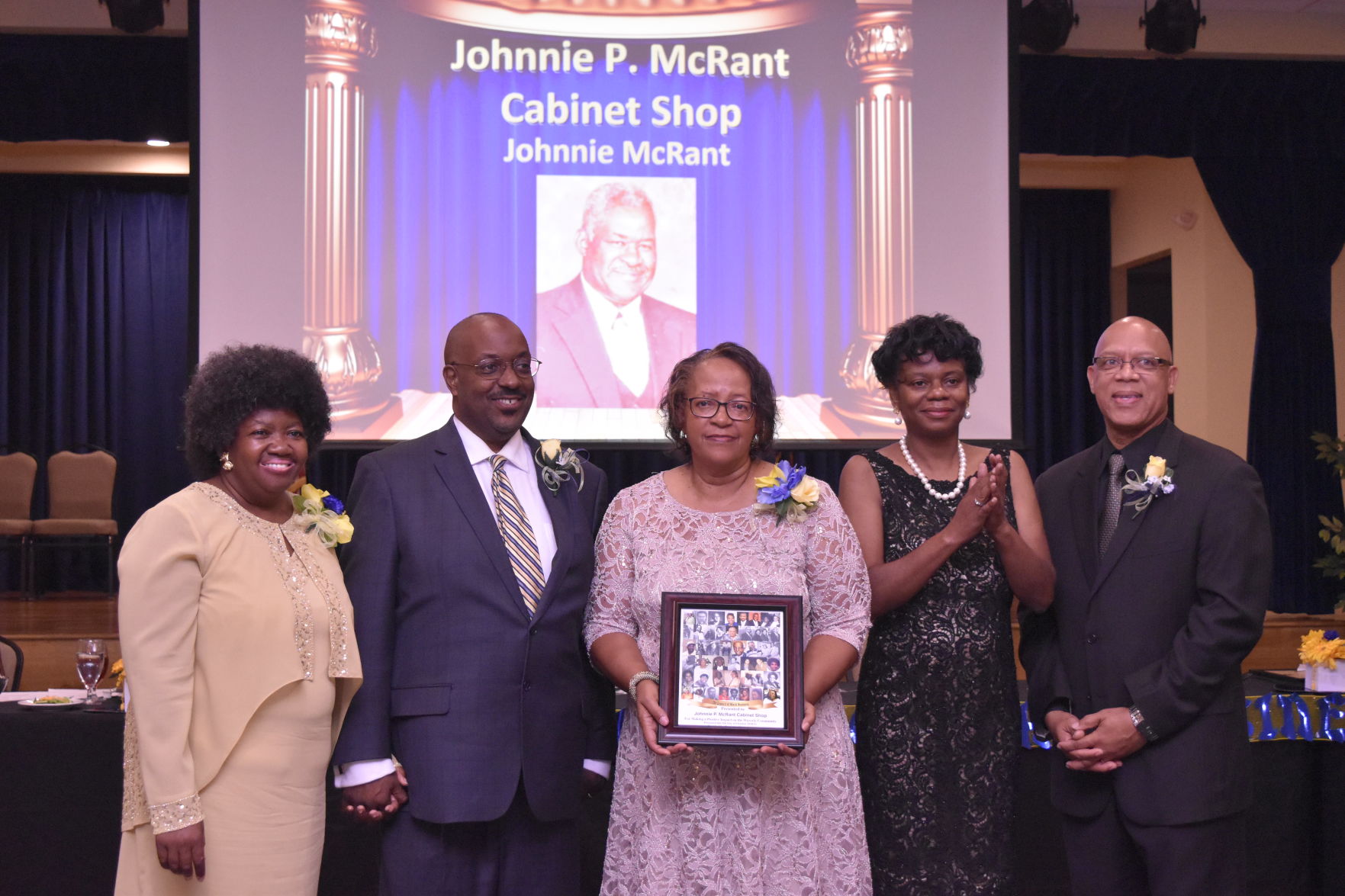Helen Roberts-Hollis receives Legacy Award for Johnnie P. McRant Cabinet.
